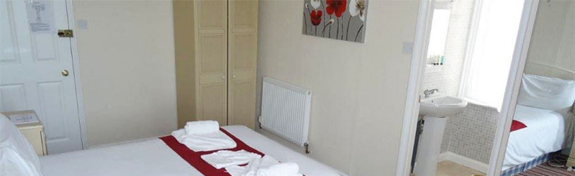 Bedroom and en-suite in the Manor Hotel Mundesley